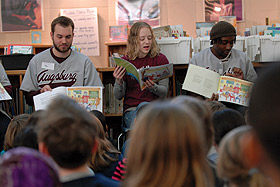 Picture of students reading a book
