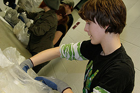 Picture of students sorting trash.