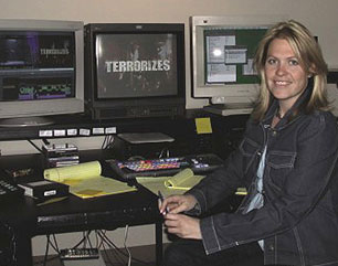 Erica Benson in front of computer