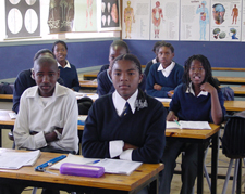 Classroom in Namibia with native students sitting in a classroom, ready to learn.