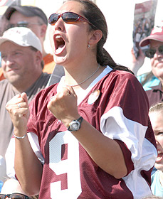 Picture of an Augsburg student rallying to the cause.