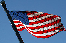 Picture of an American flag on campus.