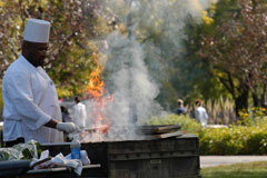 chef grilling at picnic