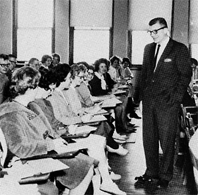 Black and white photo of Prof. Torstenson teaching.