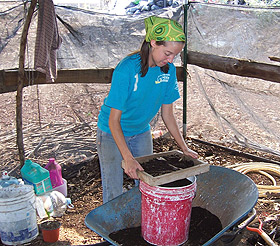 Picture of a student working at a field site abroad.