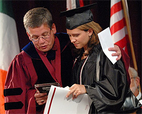 Picture of Stacy Schmitt with President Pribbenow.