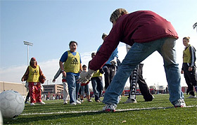 Picture of people playing soccer on the Edor Nelson Field.