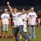 Picture of woman pitching in Metrodome