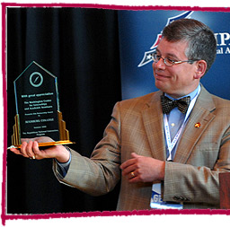 Picture of President Pribbenow and award.