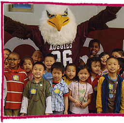 picture of Auggie Eagle and students