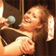 red-haired girl with microphone, honors program vignettes