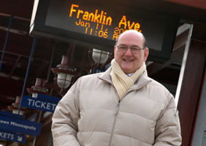 Tom Ruffaner standing in front of Franklin Lightrail station.