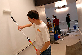 Picture of volunteers painting the tunnels.
